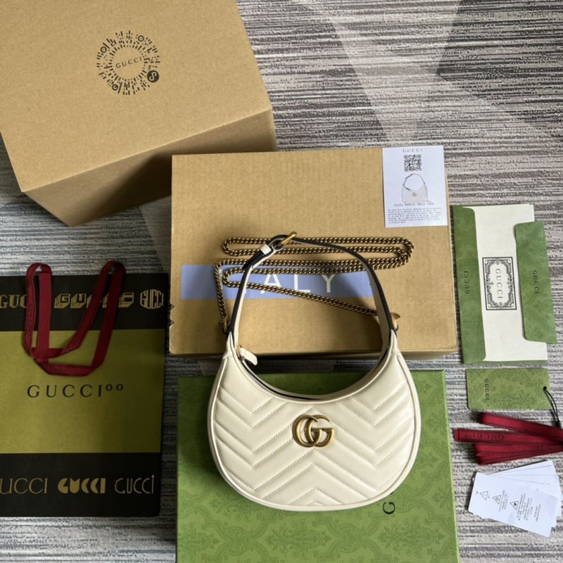 G*u*i top handle bags